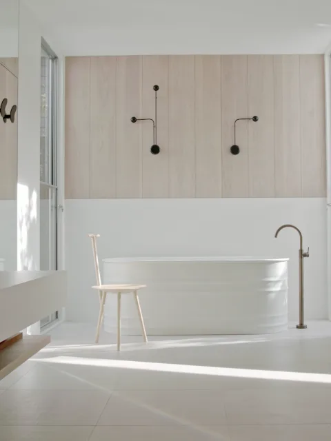 A newly finished bathroom with a freestanding bath