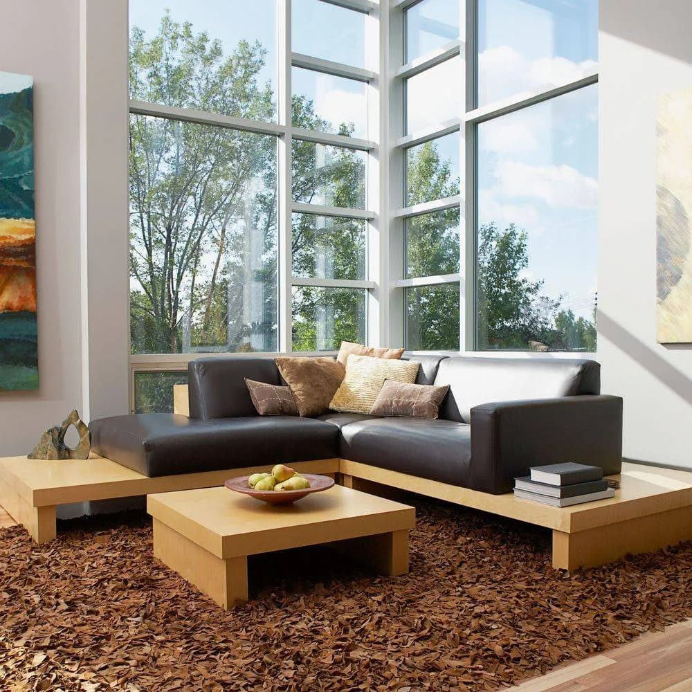 A sunlit living room with a deep-pile rug